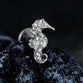 Orecchino cavalluccio marino in argento e oro con piercing al titanio 16G retro piatto