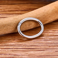 Piccolo anello semplice per setto in titanio 16G argento oro