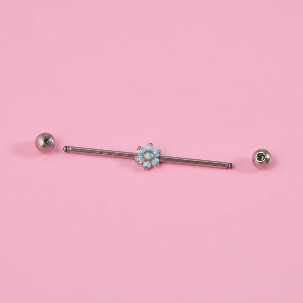 Opal industrial piercing with a flower clear white and blue opal barbell piercing titanium 14G