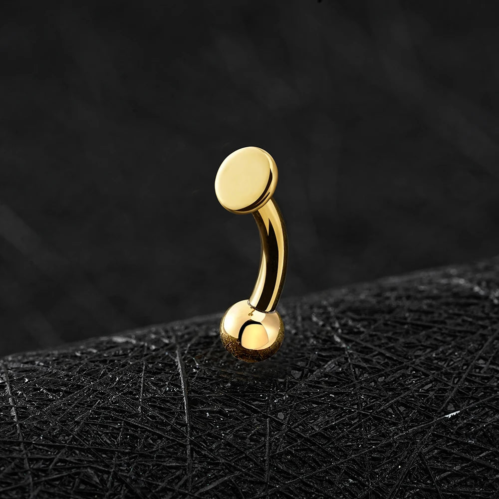 Rhino nose piercing with a flat disc a flat top titanium curved barbell