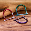 Piercing unico al setto nasale in anello clicker a forma di U in titanio rosso, viola e verde
