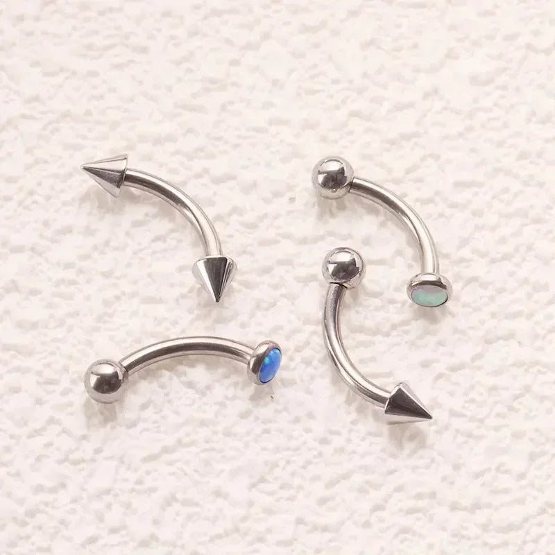 Piercing crocs d'ange avec une courte pointe et une boule en titane barbell courbé banane barbell 16G