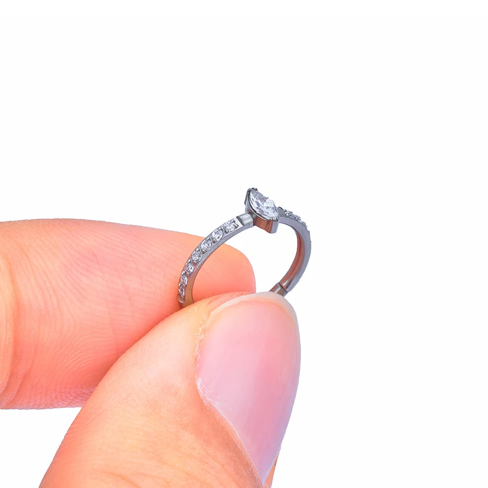 Snug piercing ring 16G titanium with marquise CZ stones hinged segment clicker