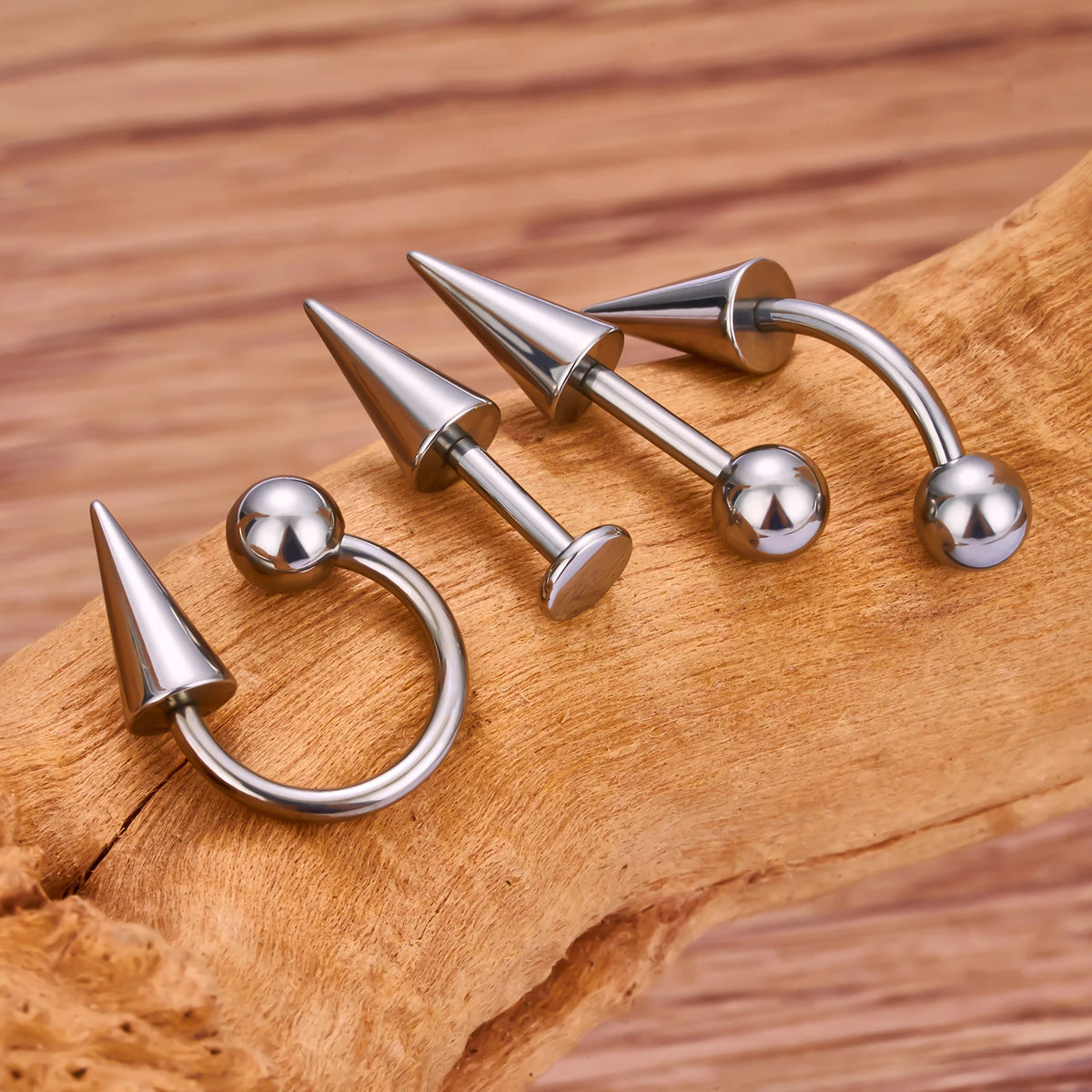 Vertical helix spike with one ball and one spike in silve titanium straight barbell 16G