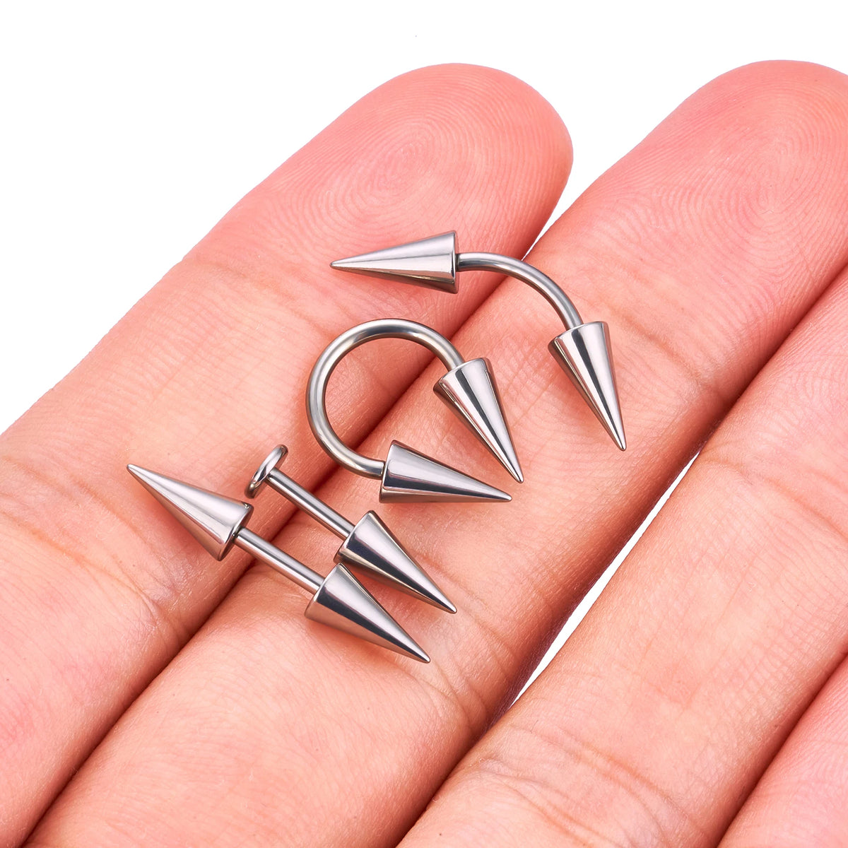 Verticale snakebite piercing met lange spikes titanium hoefijzerhalters 16G