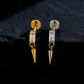 Dangle cartilage piercing with a spike titanium labret stud