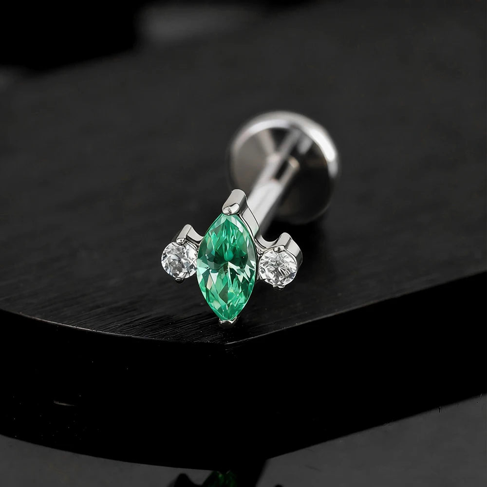 Christmas stud earring with a marquise green stone three-stone