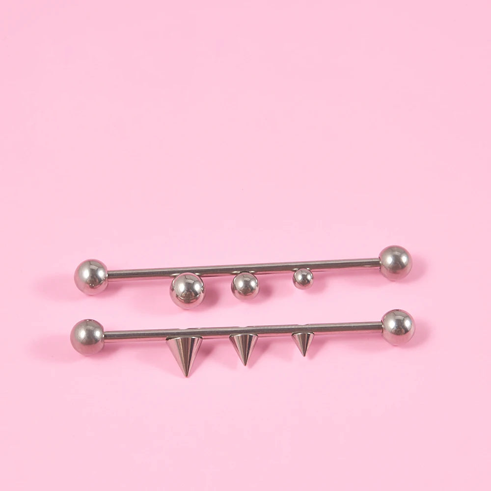 Stoere industriële piercing voor heren voor dames met 3 bolletjes titanium barbell 14G 38mm