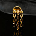 Gold Hidden Helix ear piercing with three chains and beads