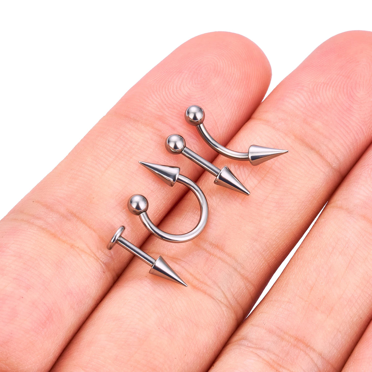 Vertical helix spike with one ball and one spike in silve titanium straight barbell 16G