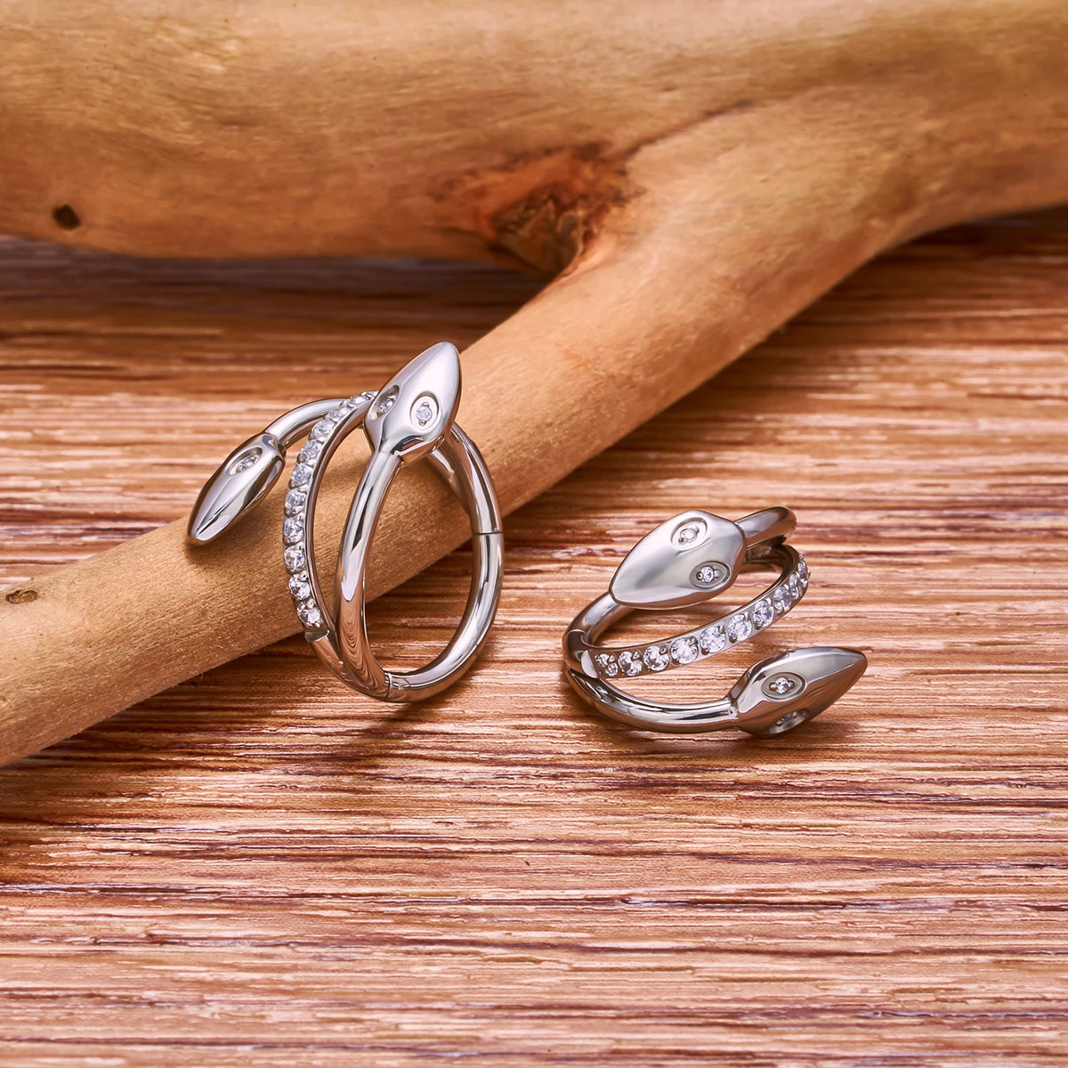 Snake nose hoop with a two-headed snake and clear cz snake bite hoop piercing