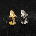 Rocket piercing rocket ship earring titanium labret stud with a dangling cz stone