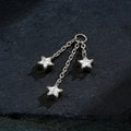 Star charm for piercings with three chains and clear cubic zirconia stones