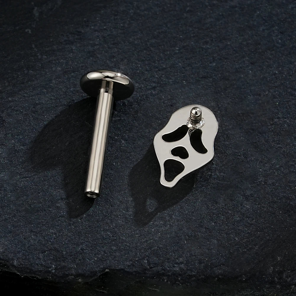 Screaming skull piericng in black silver and gold made of titanium ghost earring Halloween jewelry
