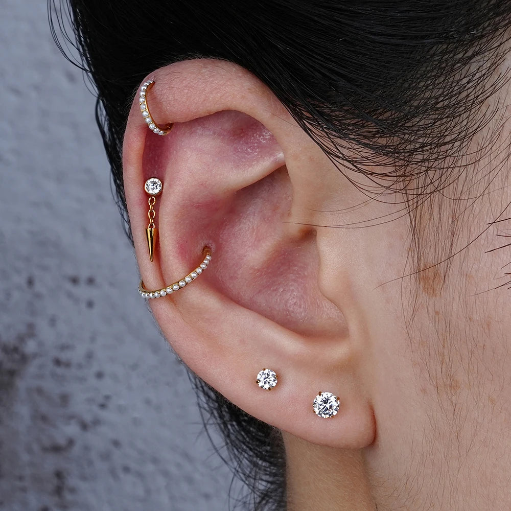 Spike helix piercing titanium dangle earring stud with a clear diamond and a chain silver and gold