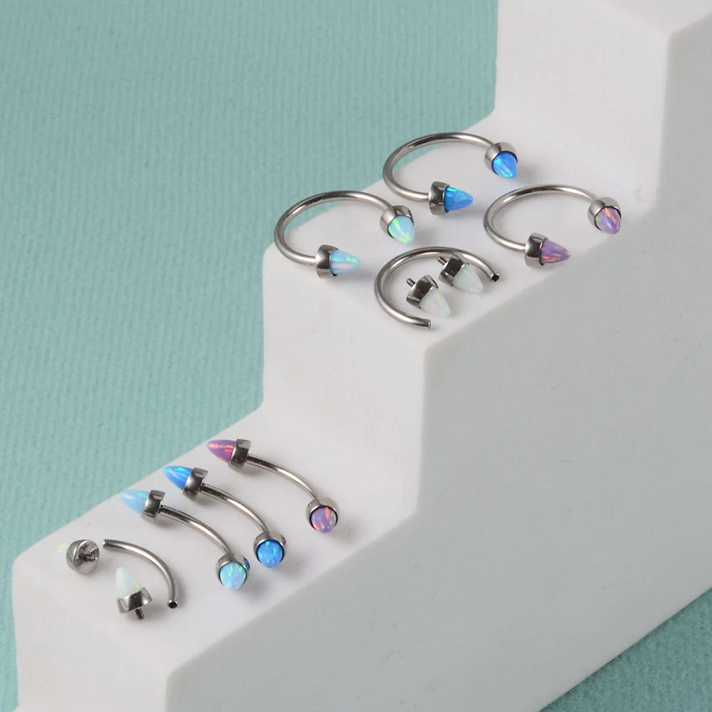 Piercing al sopracciglio a punta con bilanciere curvo in titanio opale bianco blu viola