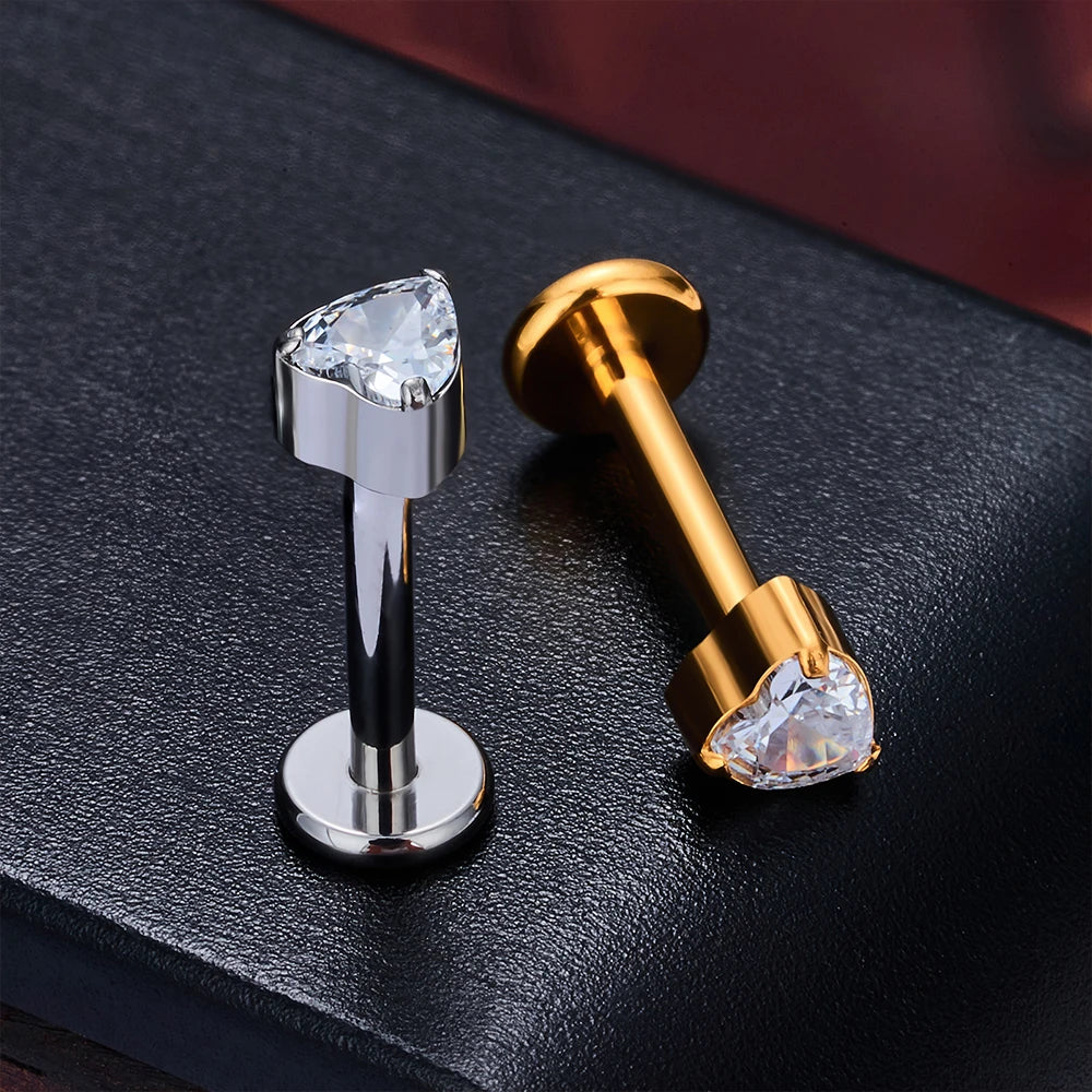 Titanium oorknopjes met een hartvormige diamant 16G goud zilver