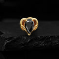Black diamond body piercing in a heart shape black Nostril piercing