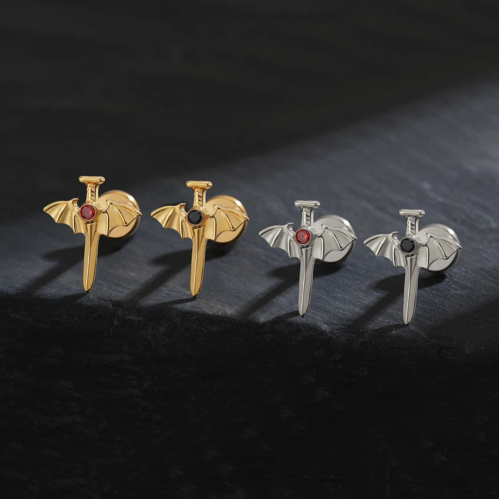 Sword ear piercing with bat wings and a red stone made of titanium halloween jewelry