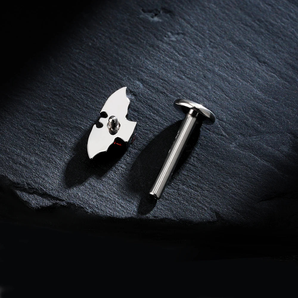 Bat helix piercing with a red stone titanium vampire piercing Halloween jewelry