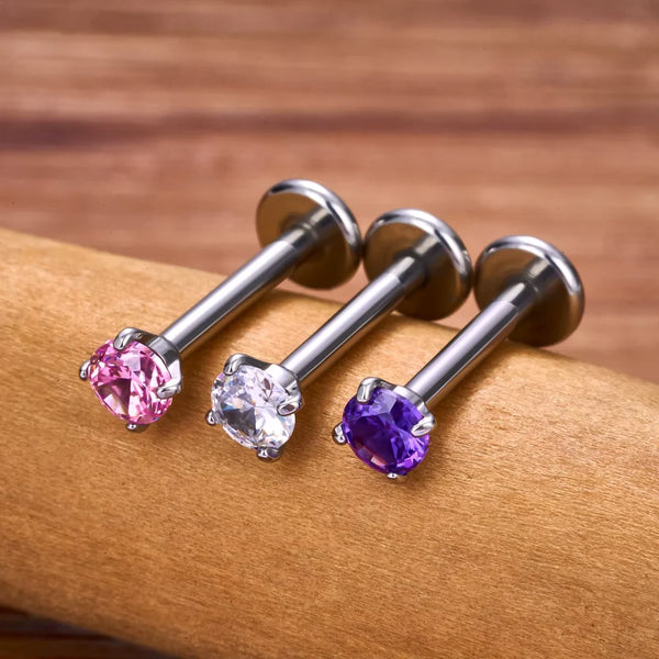Labret nose stud with a pink or purple cz stone 16G 18G titanium