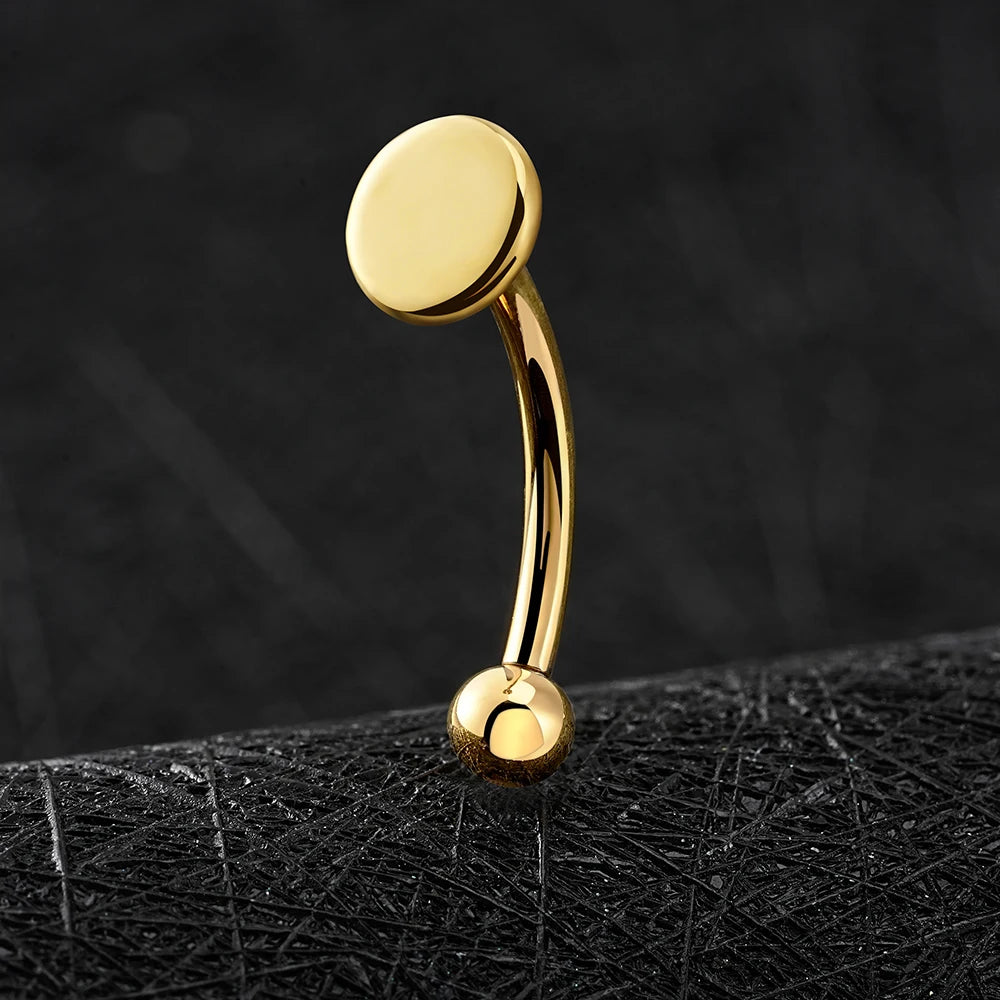 Rhino nose piercing with a flat disc a flat top titanium curved barbell