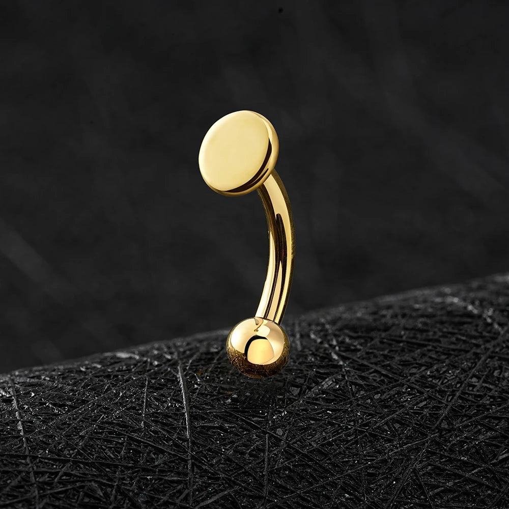 Rhino nose piercing with a flat disc a flat top titanium curved barbell