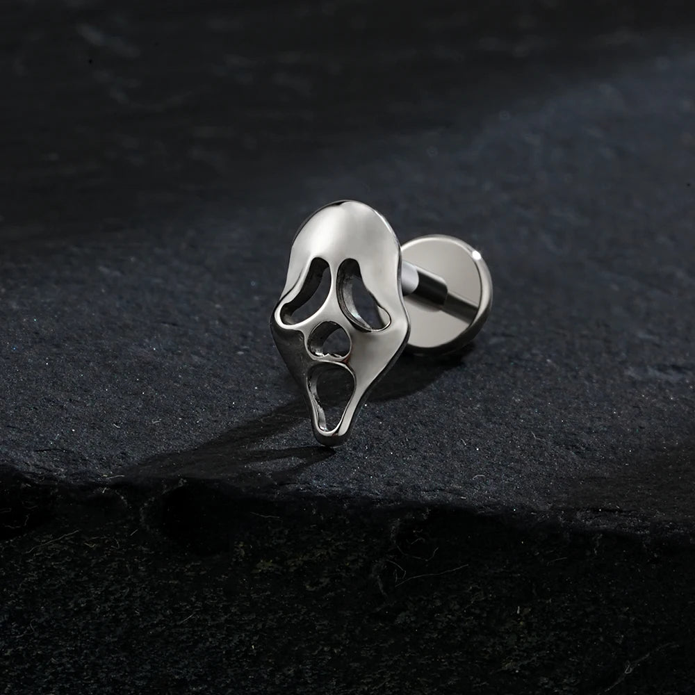 Screaming skull piericng in black silver and gold made of titanium ghost earring Halloween jewelry