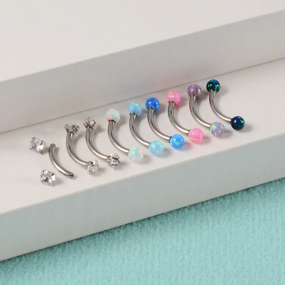 Heart eyebrow piercing cute and dainty titanium curved barbell
