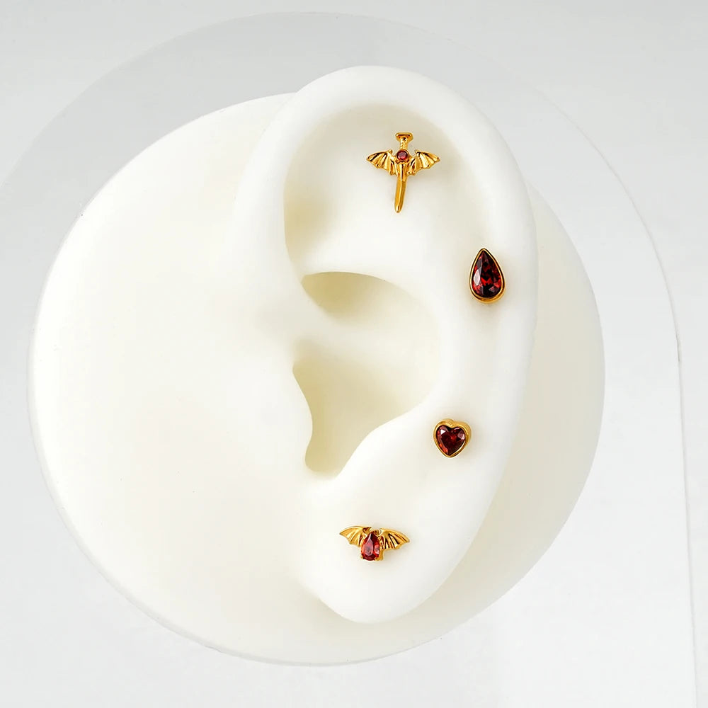 Bat helix piercing with a red stone titanium vampire piercing Halloween jewelry
