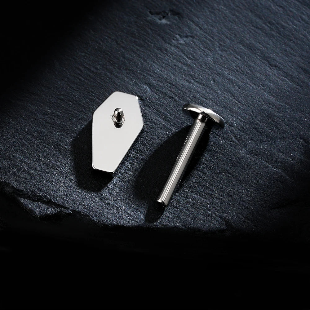 Coffin piercing titanium labret stud with a carved spiderweb Halloween jewelry
