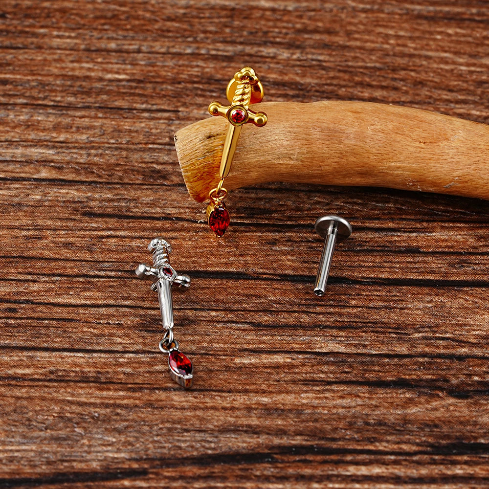 Dagger stud earring with a drop of blood in gold and silver titanium stud 16G