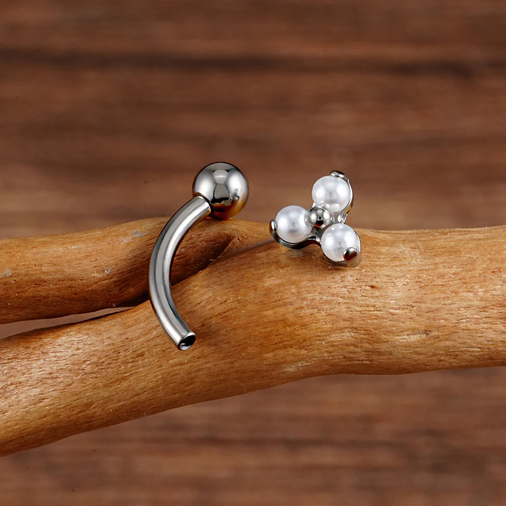 Anti-tragus curved barbell with three pearls titanium rook piercing